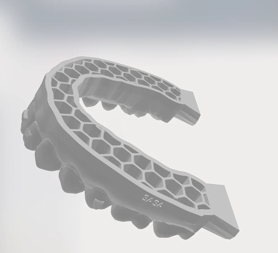 Rendering of an exported hollow dental model with a honeycomb inner structure